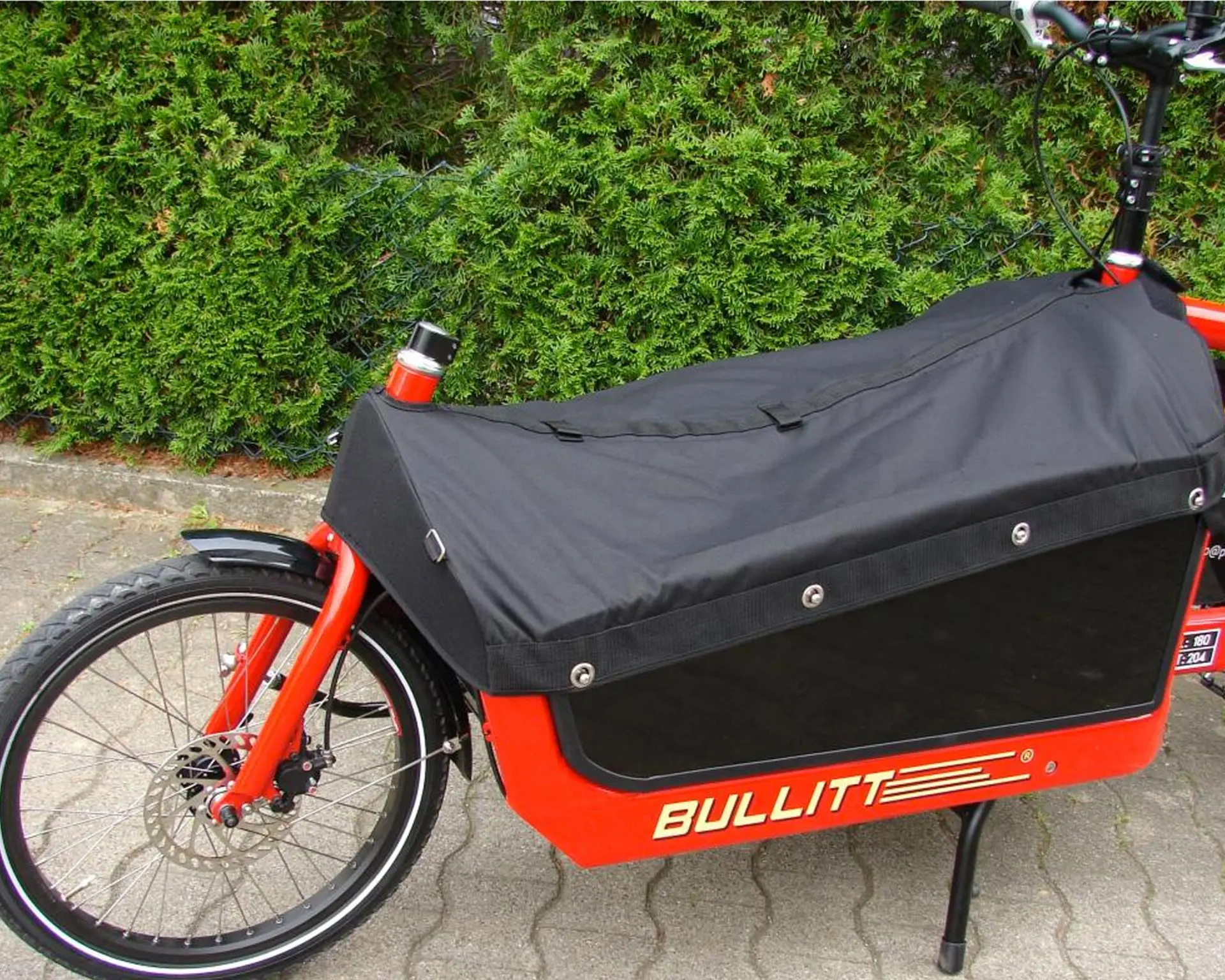 Stabile Lastenrad-Abdeckung – passgenaues Ersatzteil für trockene Transporte.